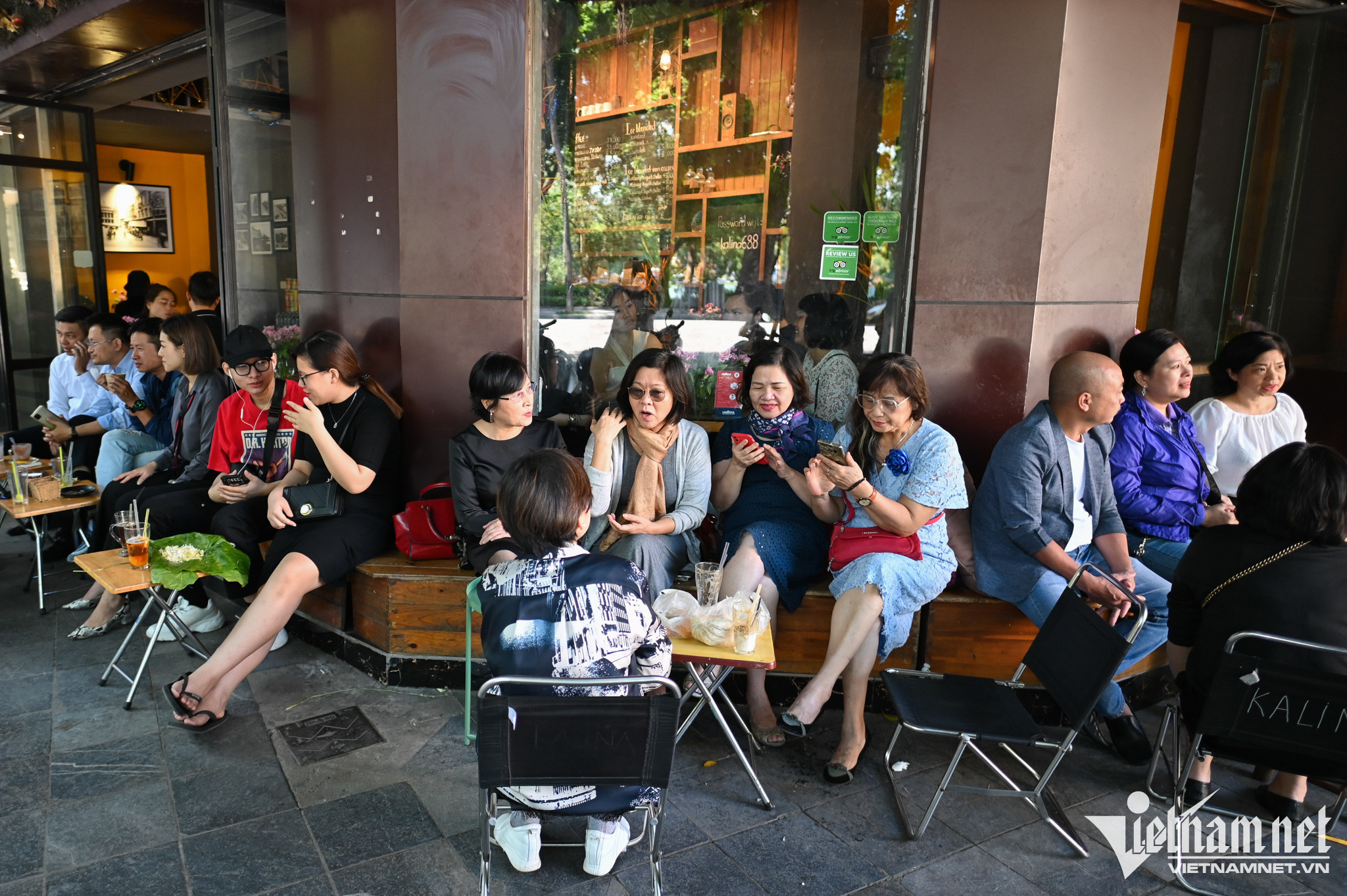 Enjoying Hanoi’s street view coffee in autumn