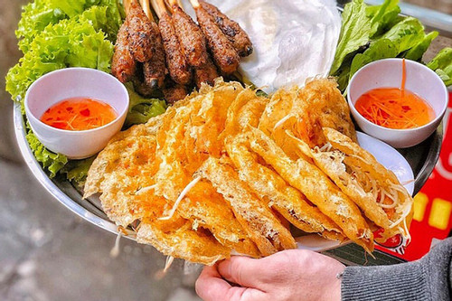 Chuyên trang ẩm thực nổi tiếng khen nức nở bánh xèo, nem lụi của Việt Nam