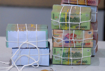 Vietnam central bank withdraws VND138.84 trillion, exchange rate cools down