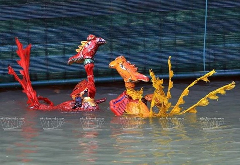 Village keeping ancient water puppetry afloat ảnh 4