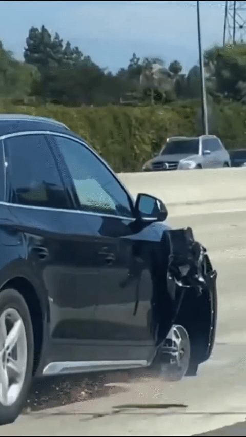 Người phụ nữ lái xe Audi còn 3 bánh chạy như bay trên đường