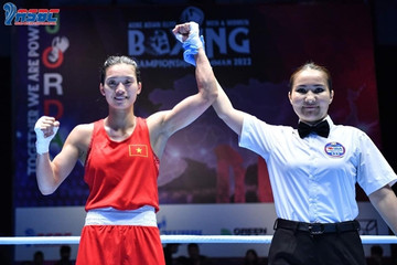 Boxer Tam wins second Asian title