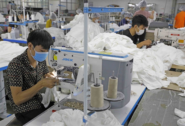 Firms urged to make greater efforts to fulfil year-end export target