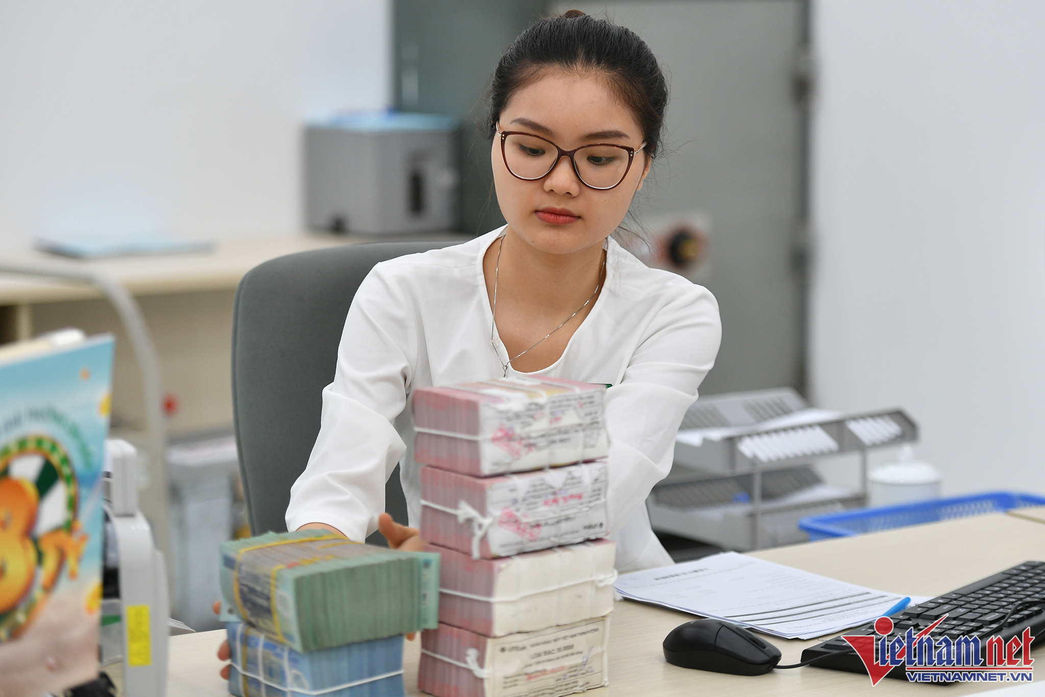 Ngân hàng Nhà nước bơm mạnh tiền qua Tết sau nới room tín dụng