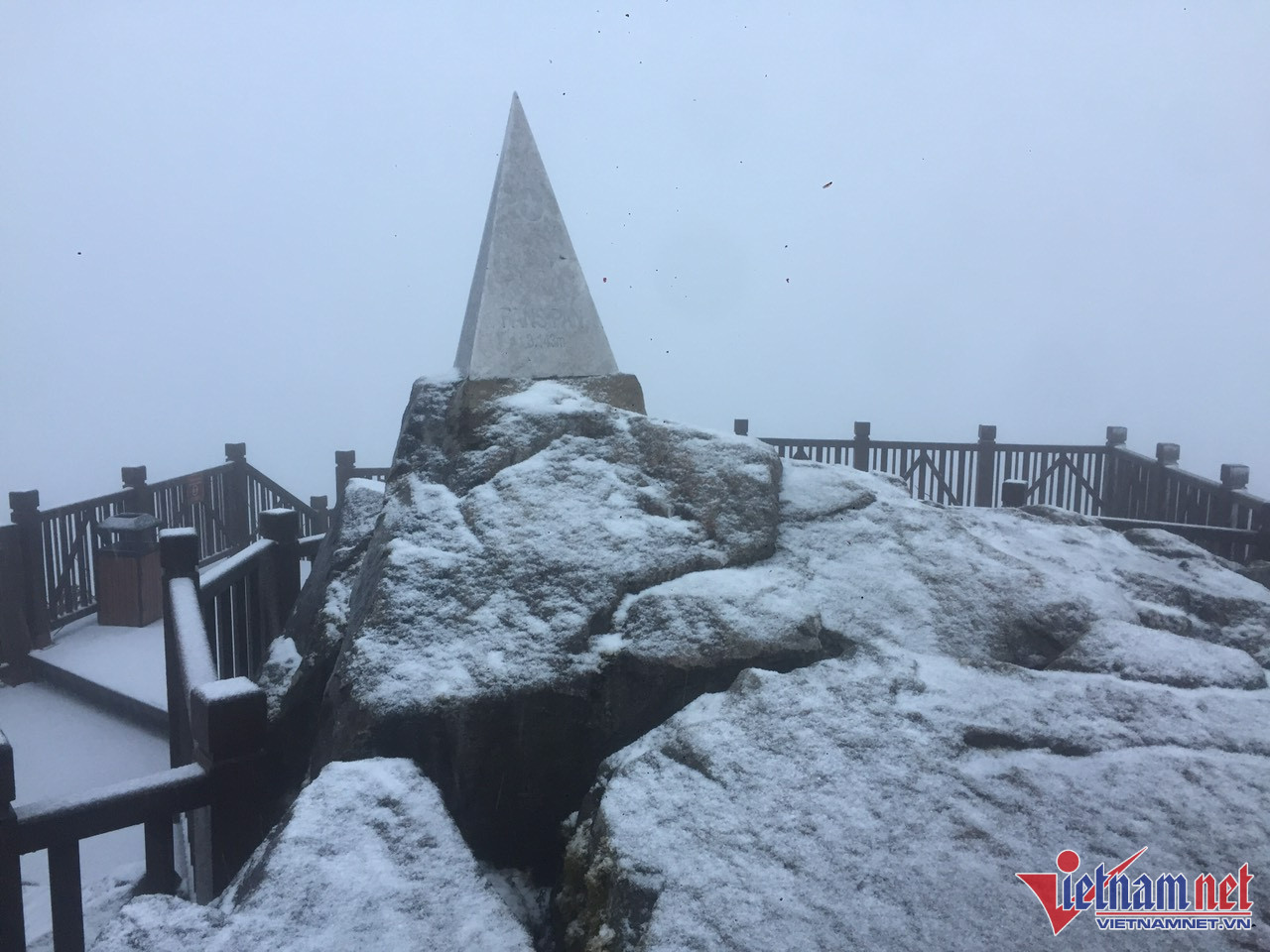 Snow covers Fansipan Mountain peak today