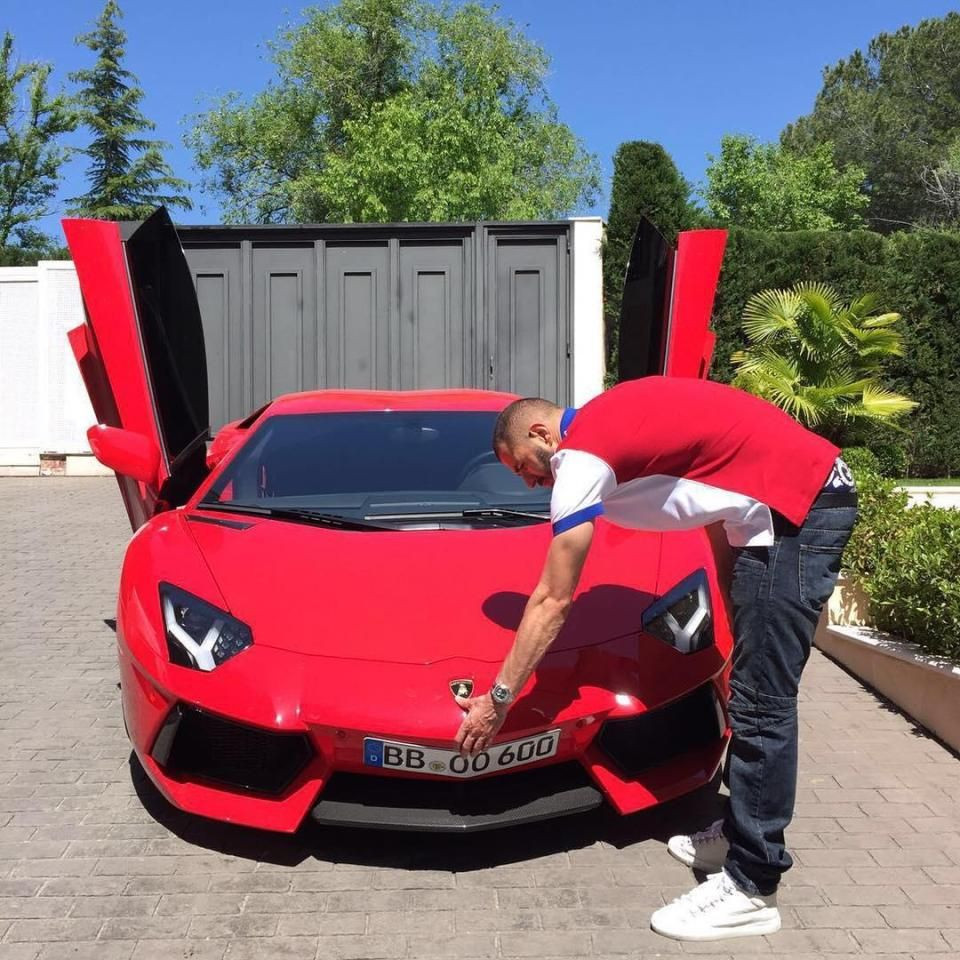 Red Lamborghini Gallardo on the driveway
