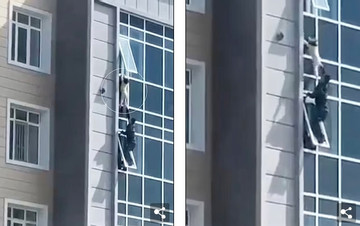 Người đàn ông cứu bé gái sắp rơi từ cửa sổ tầng 8