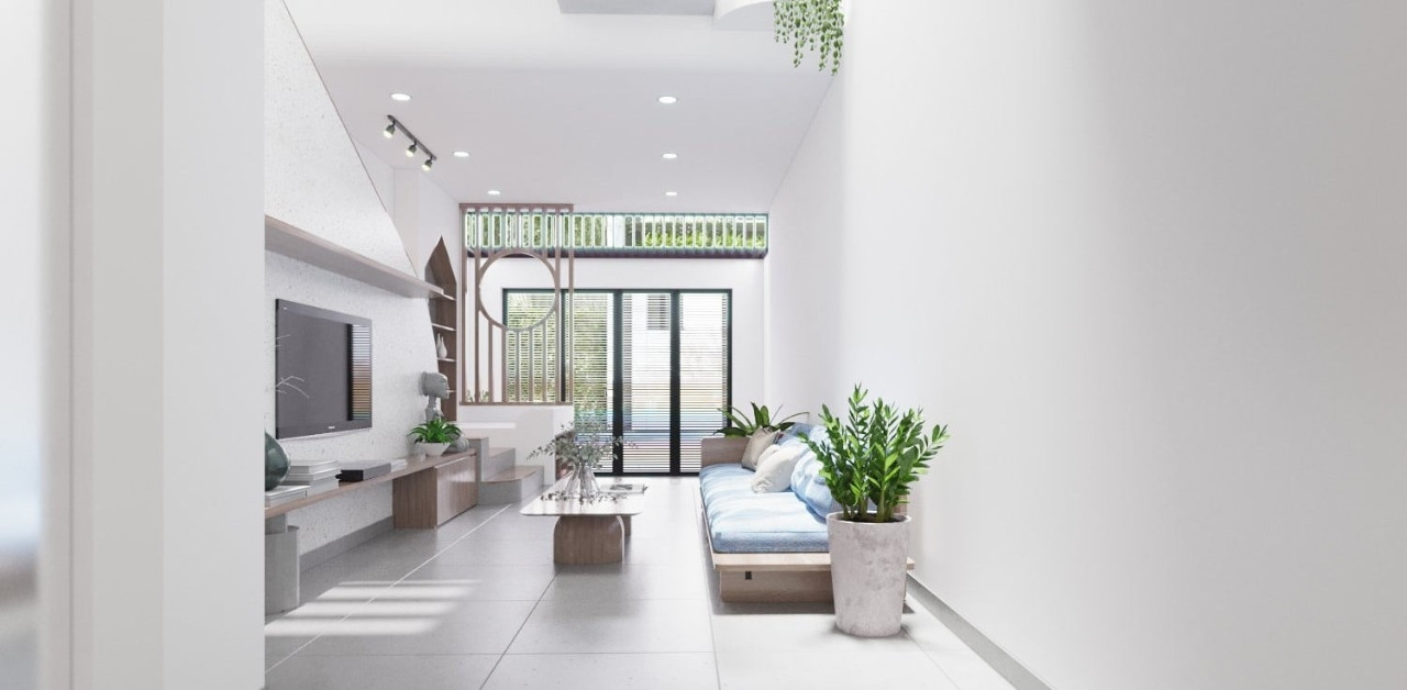 The townhouse is cool thanks to the ‘conditioning’ of nature, clear light and the breeze