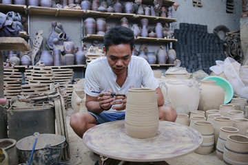 Artist goes potty preserving village craft