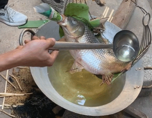 Món cá nằm võng tốn 5 lít dầu, chế biến 10 tiếng đồng hồ ở Thái Bình - 1
