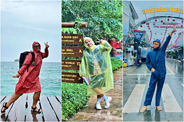 Mắc kẹt ở Phú Quốc, du khách diện áo mưa check-in từ bãi biển đến công viên