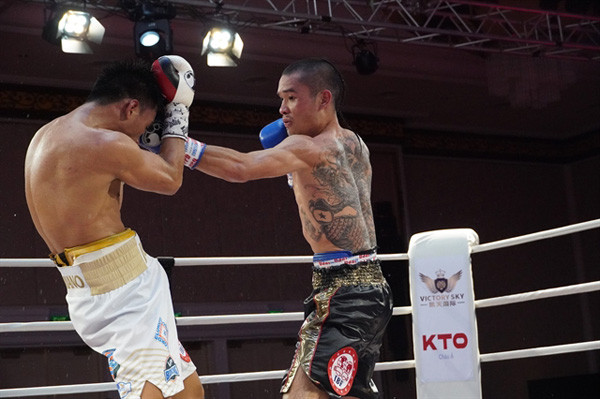 Quan defends title, heads to the world level