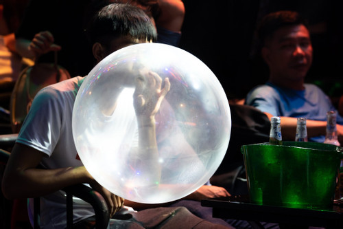 Rampant use of “laughing balls” in HCM City’s Bui Vien pedestrian street