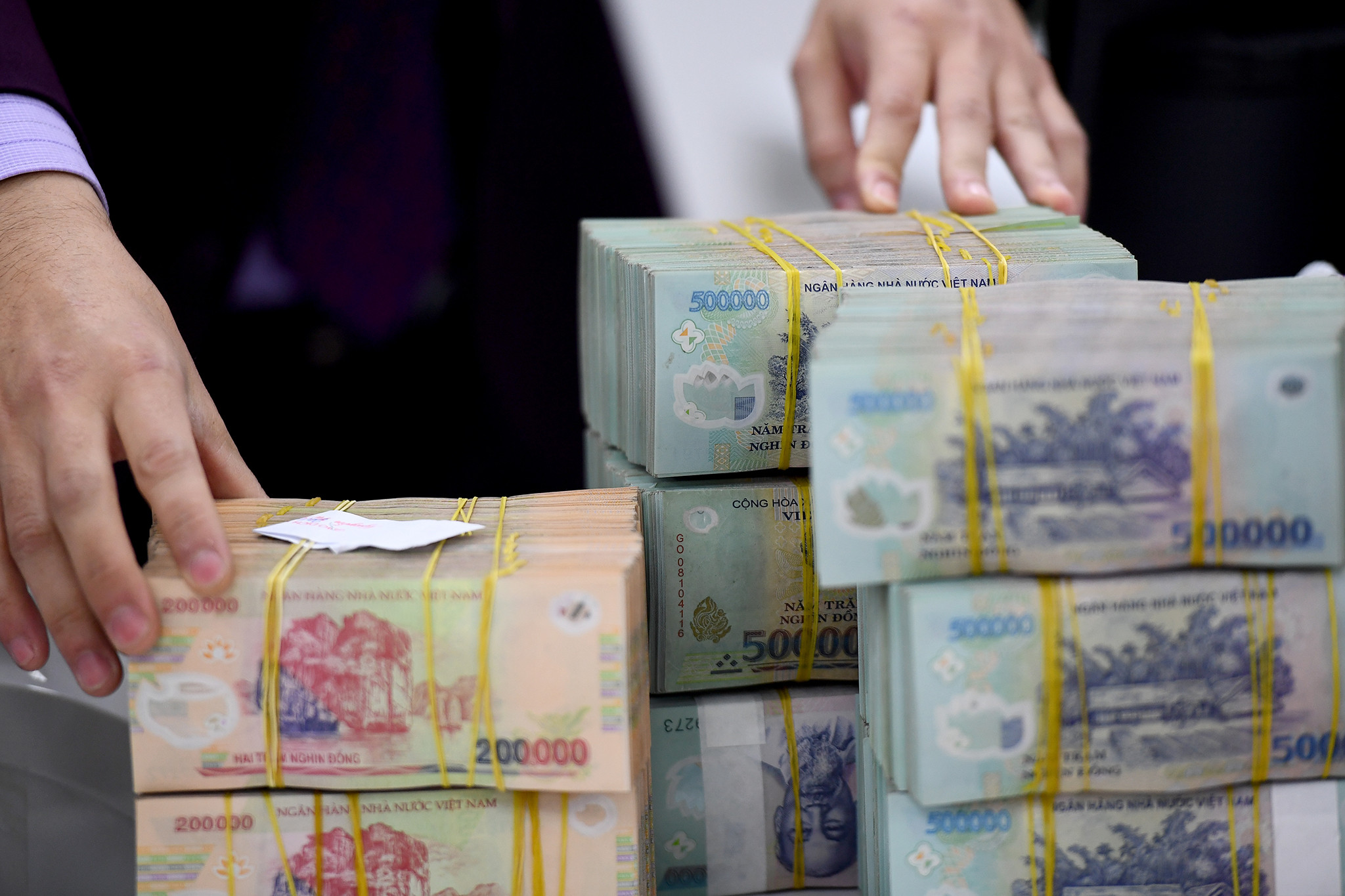 Chính sách tiền lương khi tinh giản biên chế được thực hiện thế nào?