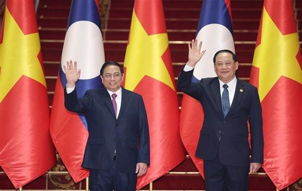 Minister: PM’s Lao visit achieves comprehensive, substantial results hinh anh 1