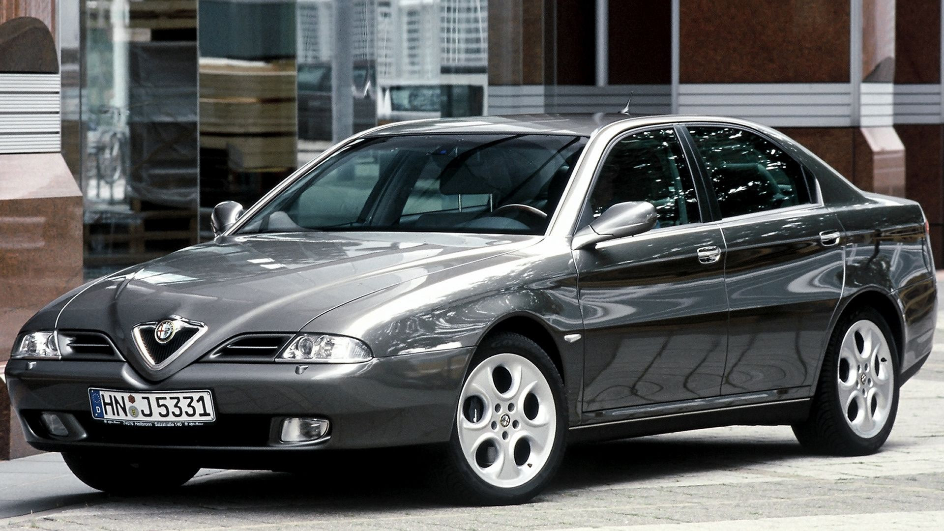 Alfa Romeo 166 parked outside