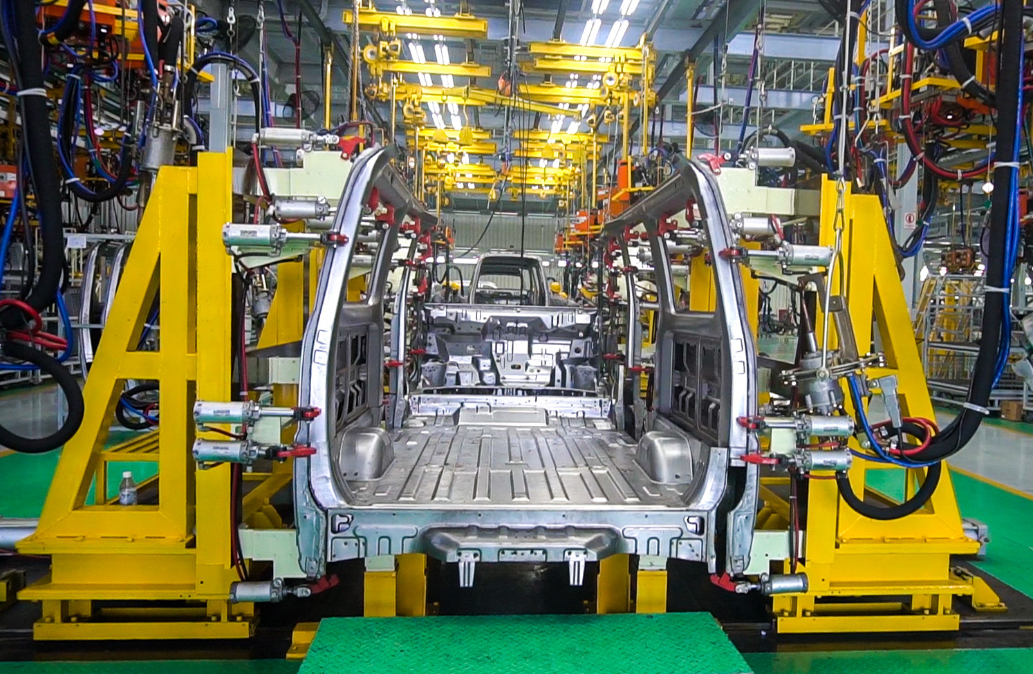 Thiết kế gia công Jig và lắp đặt hệ thống thiết bị dây chuyền hàn bấm body xe tải Towner Van.jpg