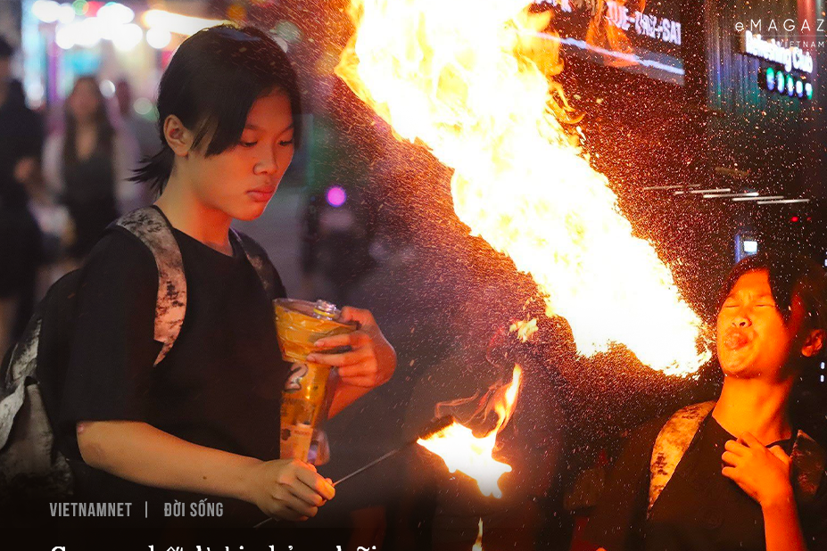 The children who earn a living by blowing fire on 'Western Street'