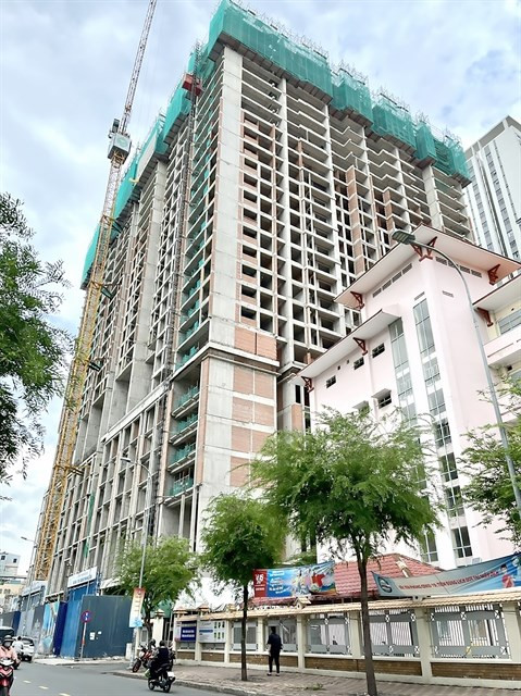 Businesses under pressure to sell assets, real estate projects to settle debts hinh anh 1