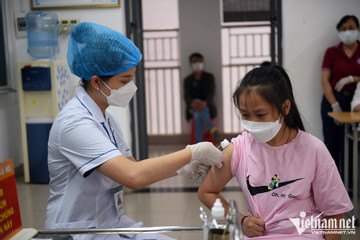 Vietnam downgrades Covid-19 to flu-like status
