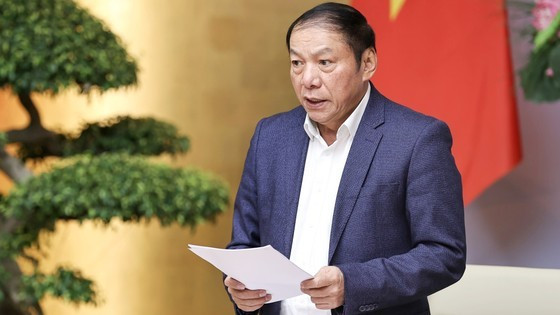 Minister of Culture, Sports and Tourism Nguyen Van Hung this morning reports at the conference. (Photo: Viet Chung) ảnh 1