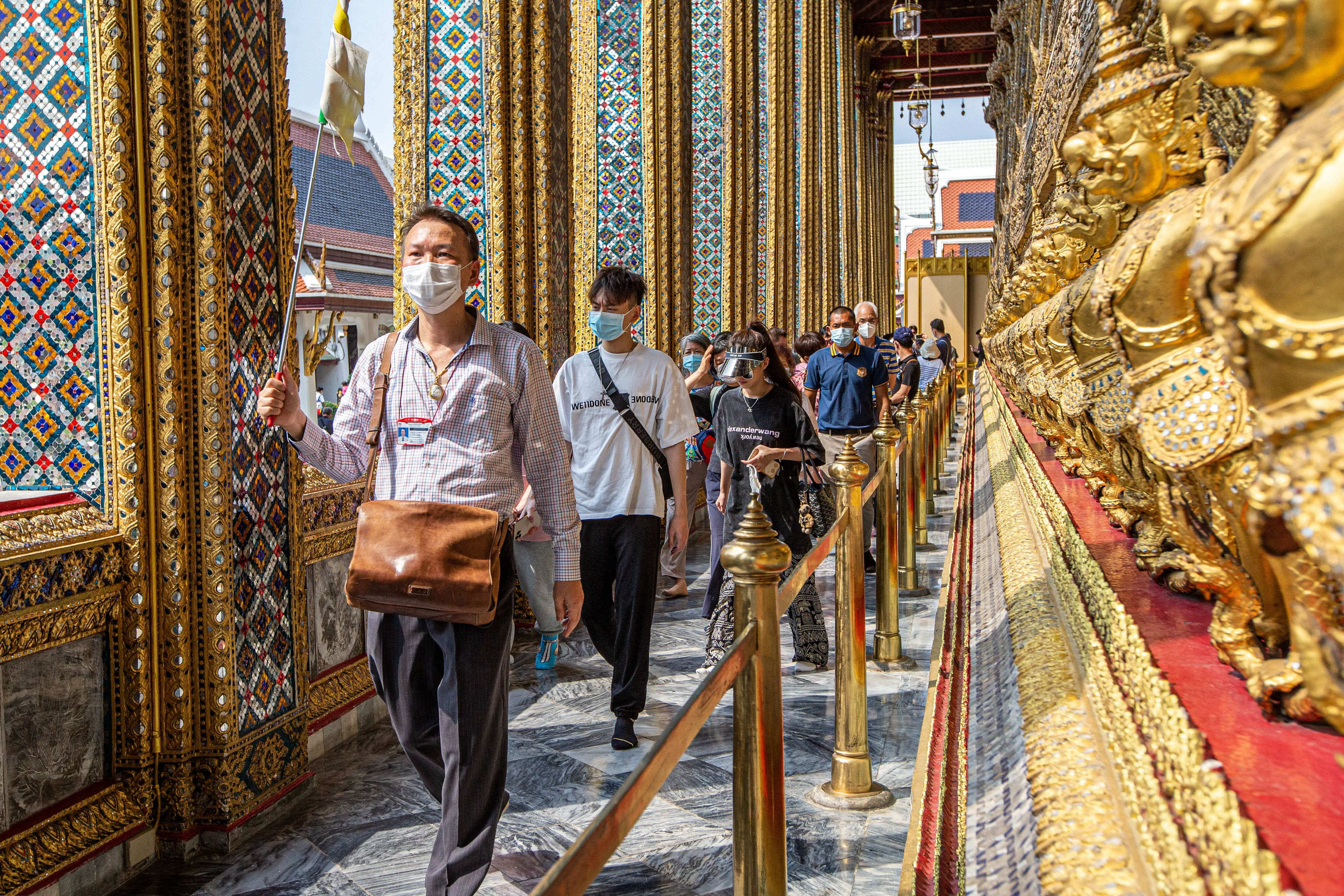 107193988 1676342813888 gettyimages 1246881152 thailand bangkok grand palace chinese tourists.jpeg