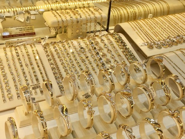 Domestic gold prices hit new record high