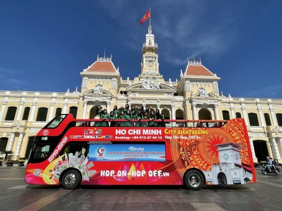 Visitors experience a double-decker bus city tour.