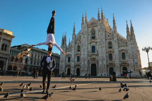 After a new world record, brothers Giang perform circus act on streets of Italy