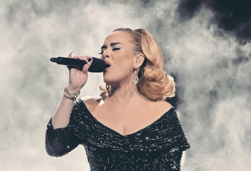 Adele wears Cong Tri's design at US show