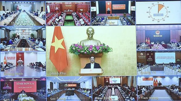 PM chairs monthly teleconference with localities hinh anh 1