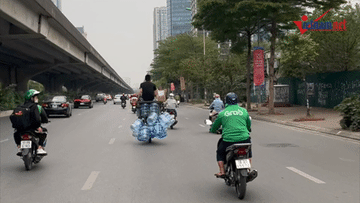 Nam thanh niên đi xe máy chở bạn 'làm xiếc' mạo hiểm trên phố Hà Nội