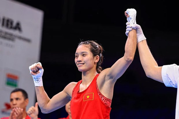 Vietnamese female boxer beats former world champion hinh anh 1