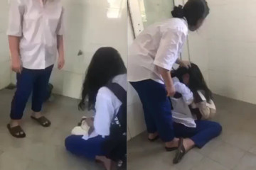 Nữ sinh lớp 8 bị bạn bắt quỳ, hành hung trong nhà vệ sinh