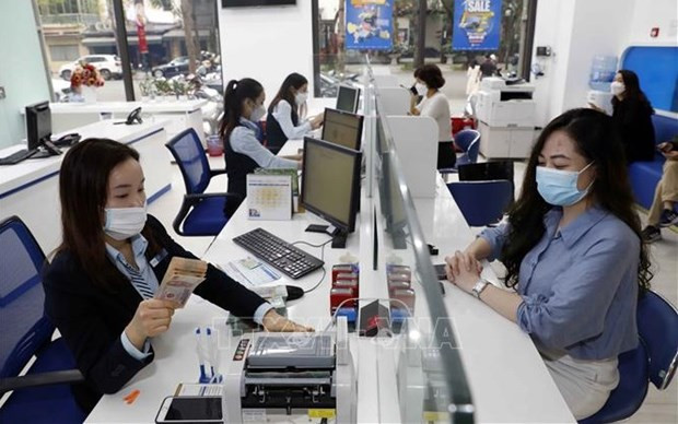 Major commercial banks agree to further reduce interest rates hinh anh 1