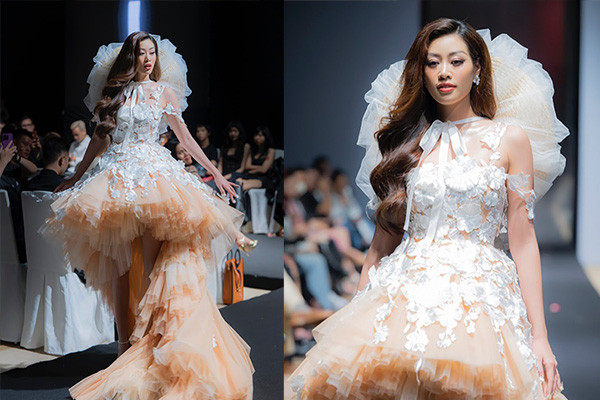 Khánh Vân mang cả cánh đồng hoa lên sàn diễn catwalk