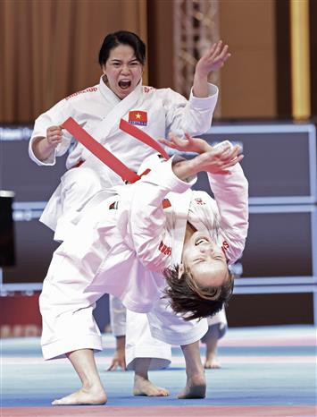 May 7: Viet Nam place fourth with five golds at SEA Games - Ảnh 2.