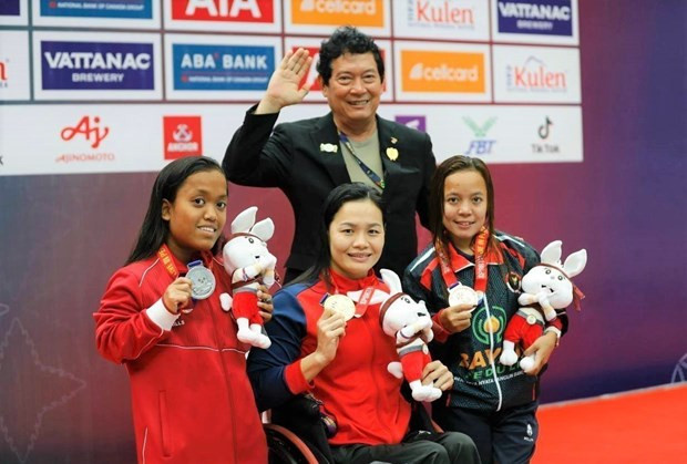Vietnamese athletes set new records at ASEAN Para Games 12 hinh anh 1