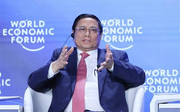 PM mentions measures against headwinds at WEF debate in Tianjin hinh anh 2