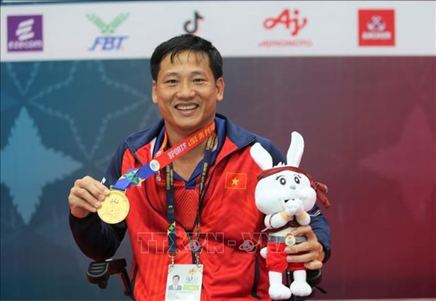 Vietnam athletes claim more Paralympic golds in swimming hinh anh 1
