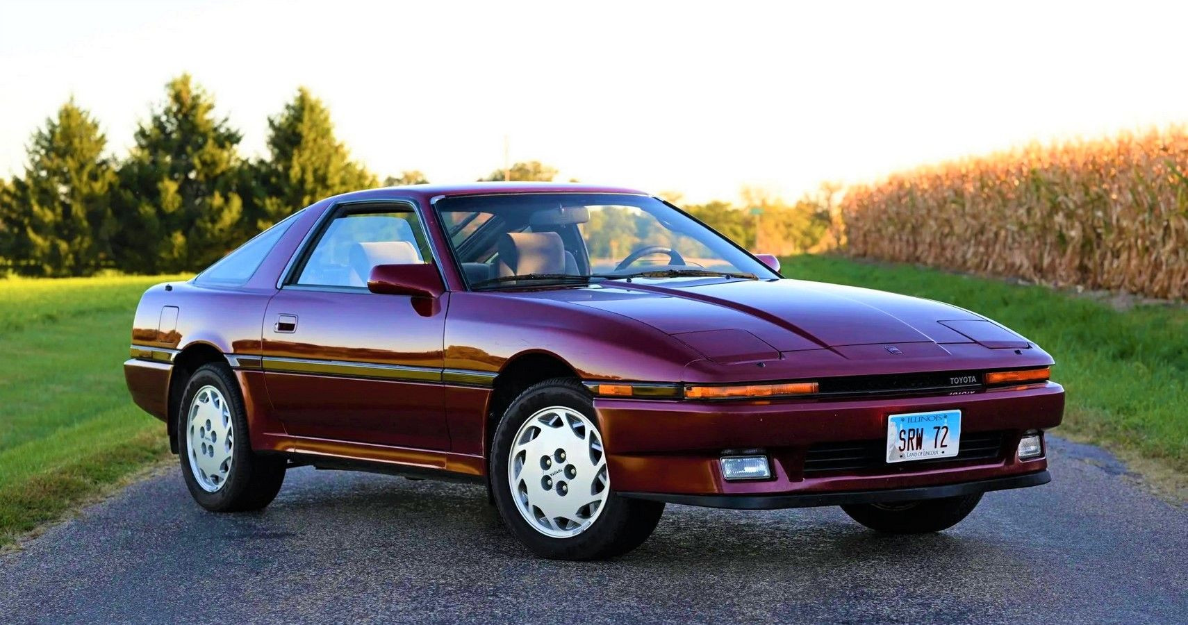 Burgundy Toyota Supra Turbo sports car parked