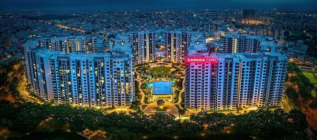Real estate market attracts foreign capital via M&As hinh anh 1