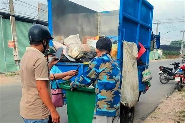 Woman detained on suspicion of dumping newborn into trash bin