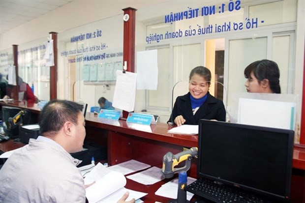 Tax authorities to cut at least 20% of compliance costs related to business activities hinh anh 1