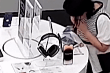 Cô gái cắn đứt dây chống trộm, cuỗm chiếc iPhone 14 Plus bên trong Apple Store