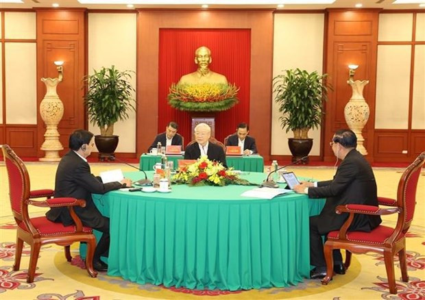 Party leaders of Vietnam, Cambodia, Laos hold high-level meeting in Hanoi hinh anh 1