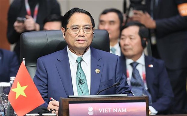 PM attends ASEAN summits with Plus Three countries, US, Canada hinh anh 3