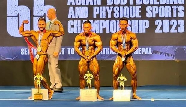 Vietnamese bodybuilders top Asian championship hinh anh 1