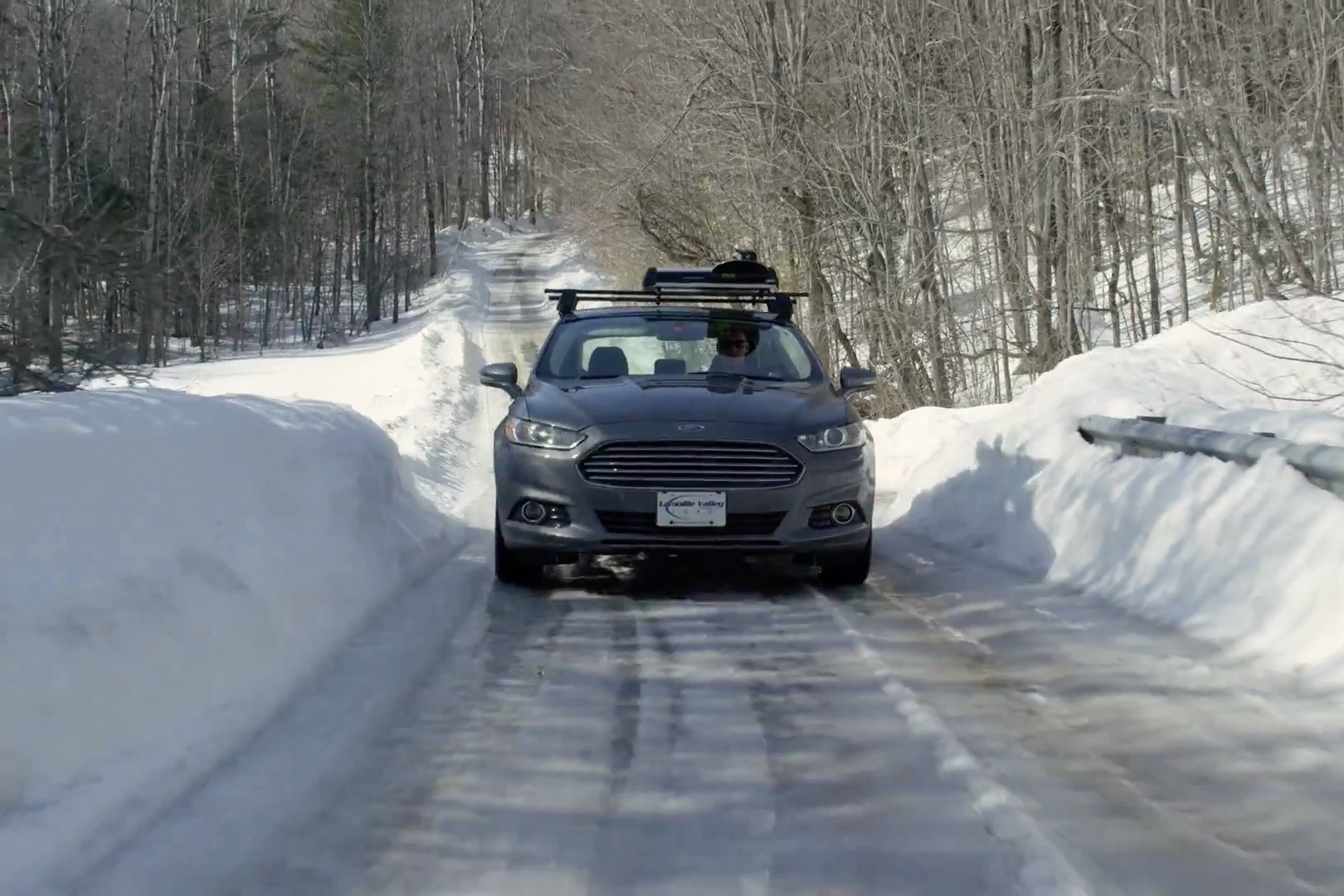 drive-electric-vt-ford-fusion-snowy-road-1.jpg