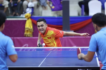 Table tennis players keep eyes on Olympics after 15 years